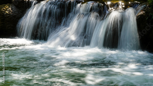 Green waterfall (Chet Sao Noi waterfall) in Thailand.