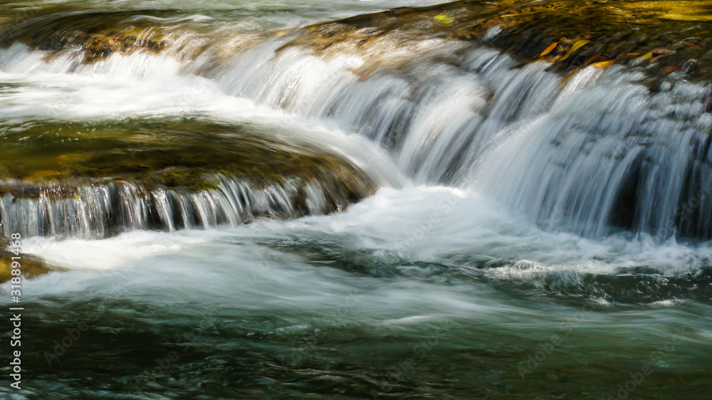 Green waterfall (Chet Sao Noi waterfall) in Thailand. Green waterfall (Chet Sao Noi waterfall) in Thailand.