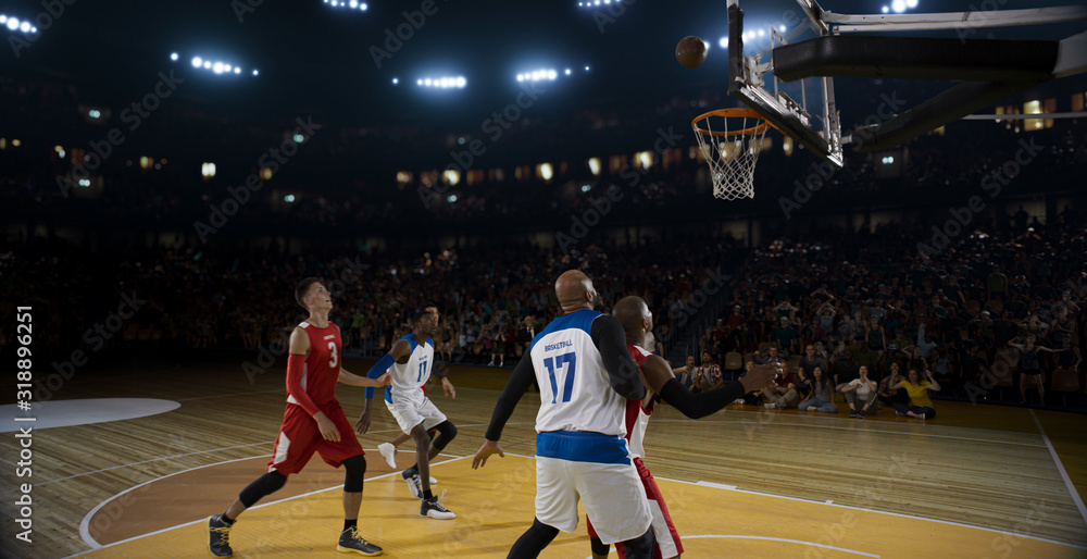 Fototapeta premium Basketball players on big professional arena during the game. Tense moment of the game.