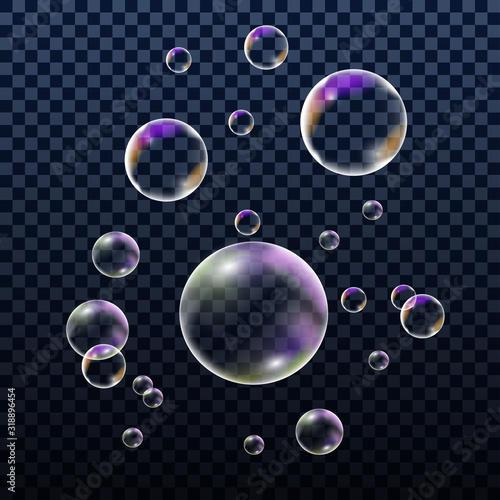 Realistic colorful soap bubbles, set of design elements isolated on transparent background. Vector illustration