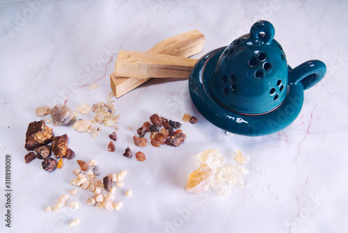 Natural incense: resin and palo santo and censer.	 photo