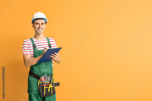 Handsome male worker with c...