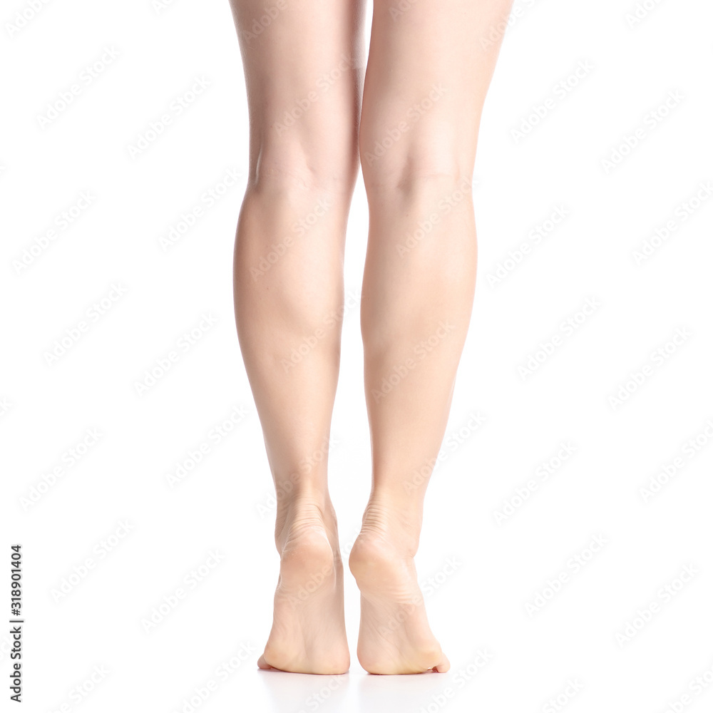 Woman female legs feet goes beauty on white background isolation Woman female legs feet goes beauty on white background isolation