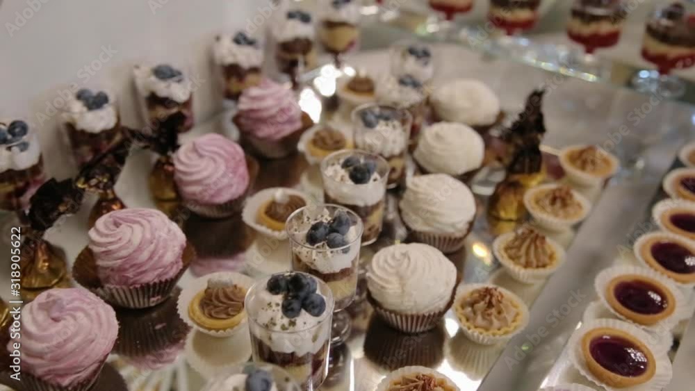 Background filled with colorful cakes and desserts with fresh fruits Background filled with colorful cakes and desserts with fresh fruits