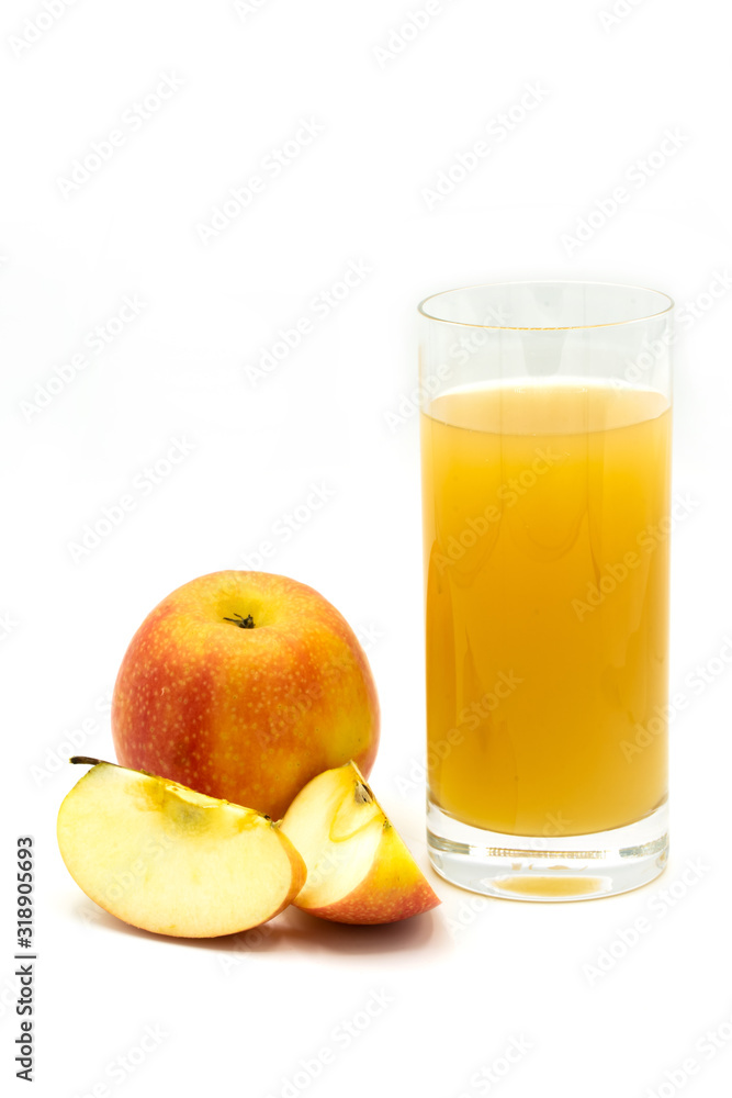 naturally cloudy apple juice - sliced yellow, red apples with a glass of naturally cloudy apple juice in front of white background naturally cloudy apple juice - sliced yellow, red apples with a glass of naturally cloudy apple juice in front of white background