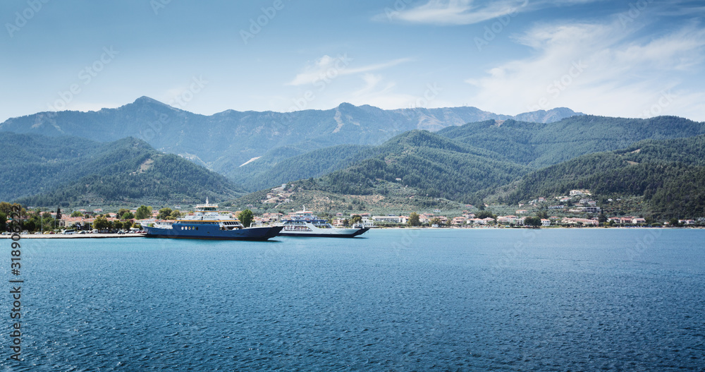 Ferries at the Island of Thasos in Greece by Summer
