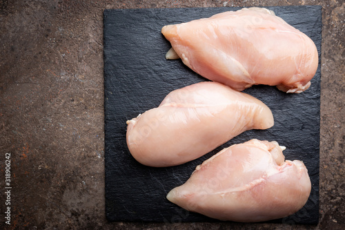 Photography Fresh raw chicken breast, top view. Culinary cooking ingredients