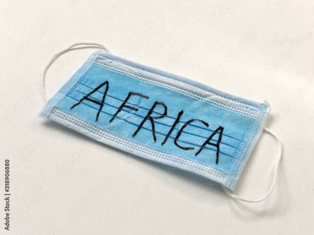 Protective medical mask with inscription Africa. Epidemia in Africa. Wuhan Coronavirus, 2019-nCoV. Protective medical mask with inscription Africa. Epidemia in Africa. Wuhan Coronavirus, 2019-nCoV.