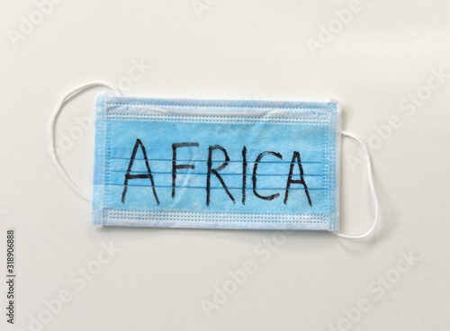 Protective medical mask with inscription Africa. Epidemia in Africa. Wuhan Coronavirus, 2019-nCoV.