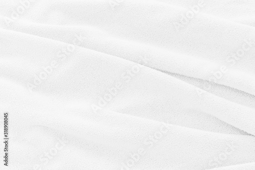 Soft white fabric texture background. Abstract cloth with soft waves for wallpaper or backdrop