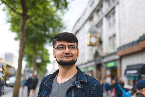 Photography portrait of smiling man in street