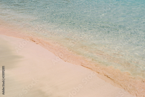 Fototapeta Naklejka Na Ścianę i Meble -  Pink beach with transparent water in Greece. Elafonissi beach, Crete Greece