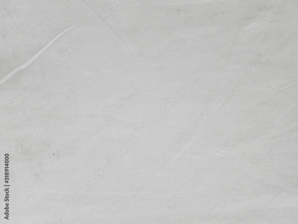 Fototapeta premium Soft white wrinkled fabric background