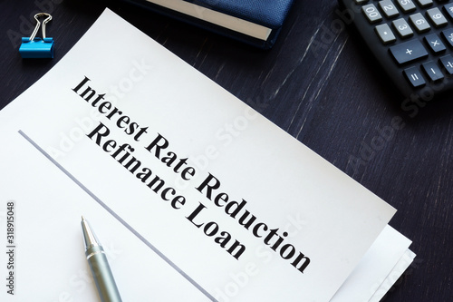 Interest Rate Reduction Refinance Loan IRRRL agreement on the desk.