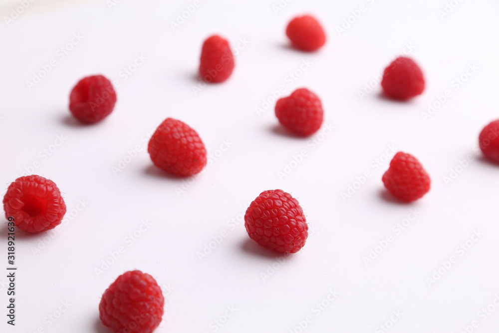 delicious raspberries in colorful background delicious raspberries in colorful background