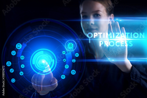 Business, Technology, Internet and network concept. Young businessman working on a virtual screen of the future and sees the inscription: Optimization process