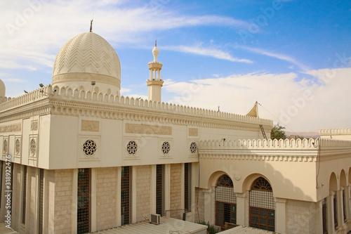 Beautiful Al Sharif Al Hussein bin Ali Mosque, Aqaba, Jordan. Shows the dome roof & carved detailed stone walls.