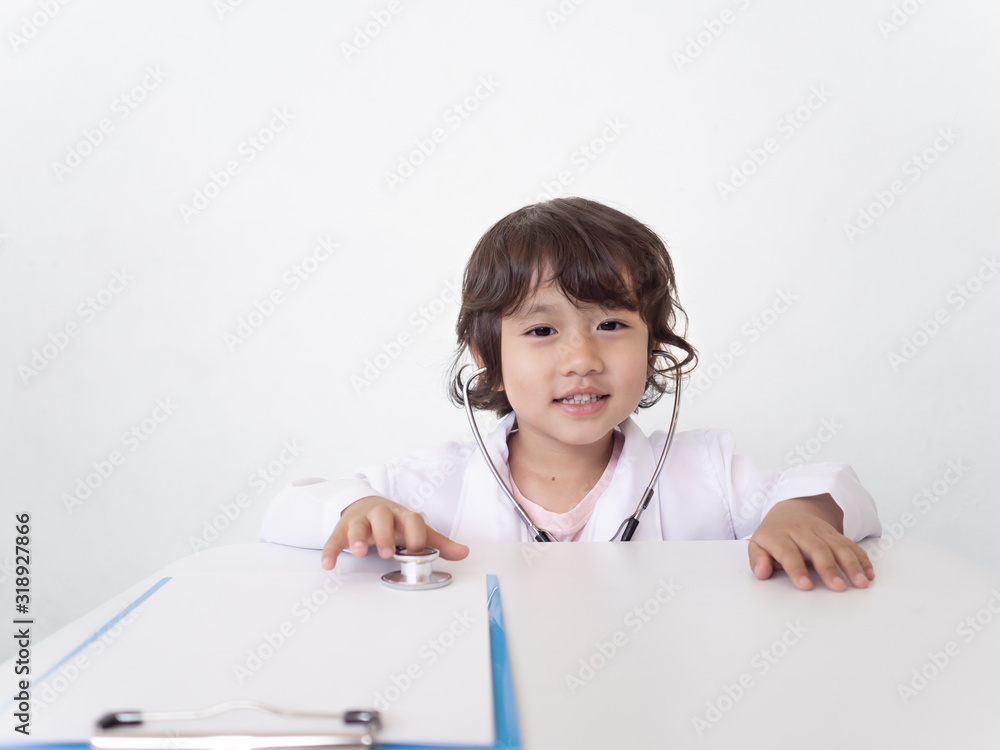 Kid girl with stethoscope, in white doctor uniform, healthy child, doctor kids Kid girl with stethoscope, in white doctor uniform, healthy child, doctor kids