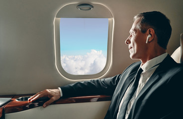 Businessman in private jet