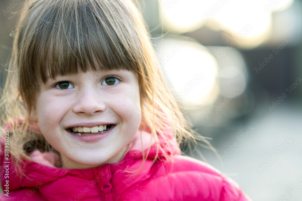 Portrait of a pretty child girl outdoors on a sunny warm autumn day. Portrait of a pretty child girl outdoors on a sunny warm autumn day.