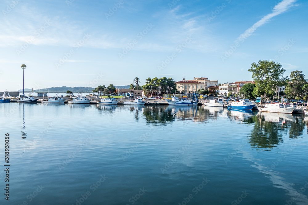 The harbor of La Caletta in Sardinia with beautiful reflections