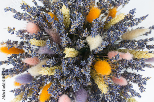 Top view of a bouquet of purple lavender flowers on a white background. Bunch of lavandula flowers. Photo from above.