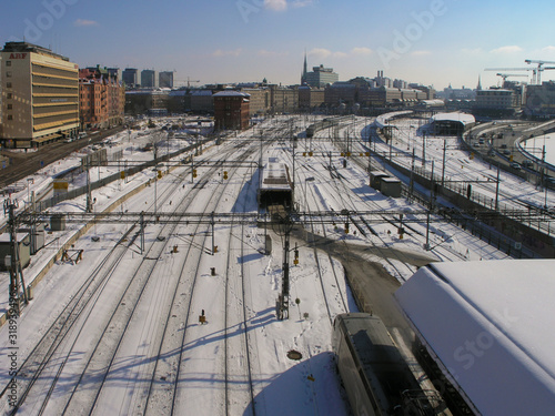 view of stockholm railway yard and skyline in winter