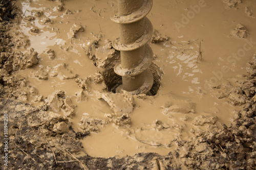 The process of drilling a water well with a winding drill