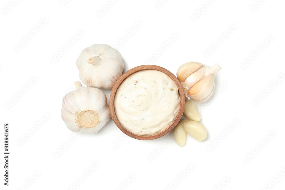 Bowl with sauce and garlic isolated on white background, top view Bowl with sauce and garlic isolated on white background, top view