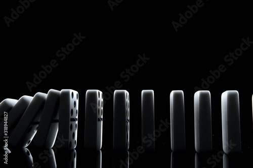 White dominoes in the dark close up photo