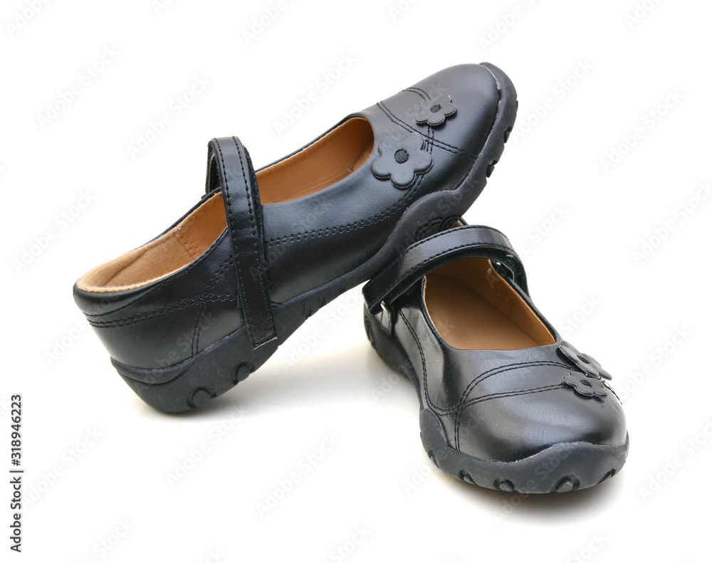 Black shine leather girl shoes isolated on white Black shine leather girl shoes isolated on white