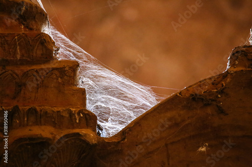 Web on the ancient stones of the old pagoda in Bagan, Myanmar