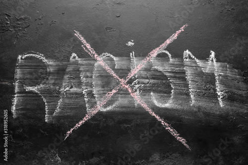 crossed out inscription racism concept stop racism, discrimination, racial problems photo