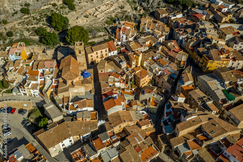 Aerial view of medieval Gothic Borriol hilltop castle ruin near Castellon Spain with blue sky