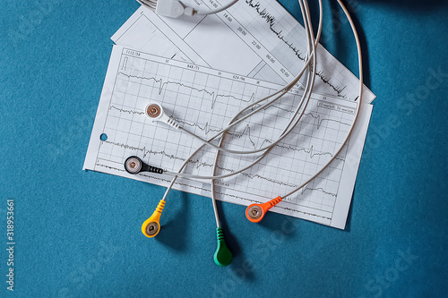 Holter monitoring device on blue  background.