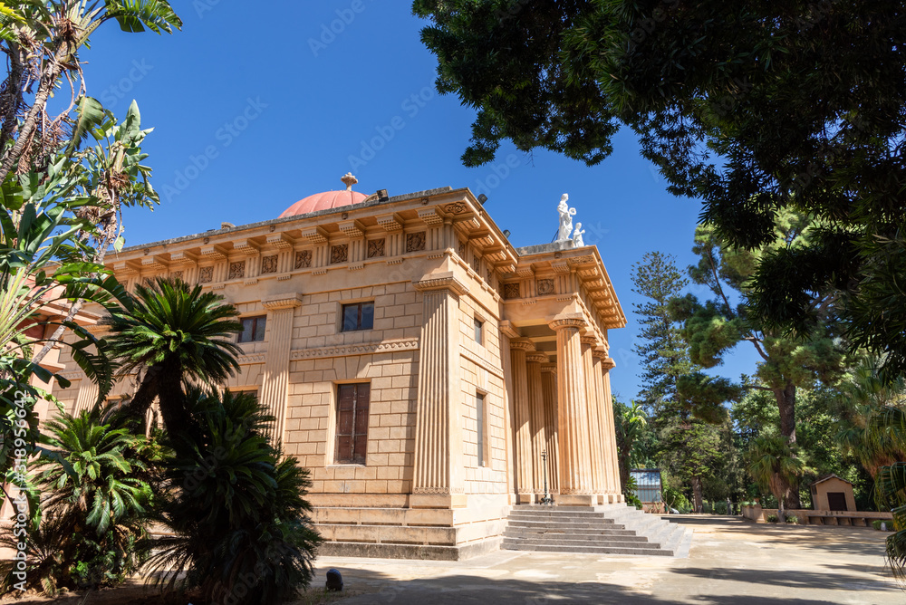 Main building in Botanical garden of Gymnasium, Conservatory and University of Palermo capital in Sicily island in summertime