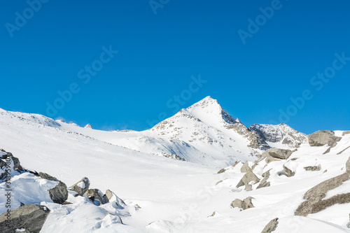 Spectacular winter mountain panorama high in austrian alps.