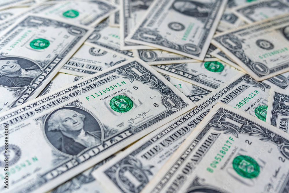 Background from one dollar banknotes. Photographed close-up. Background from one dollar banknotes. Photographed close-up.