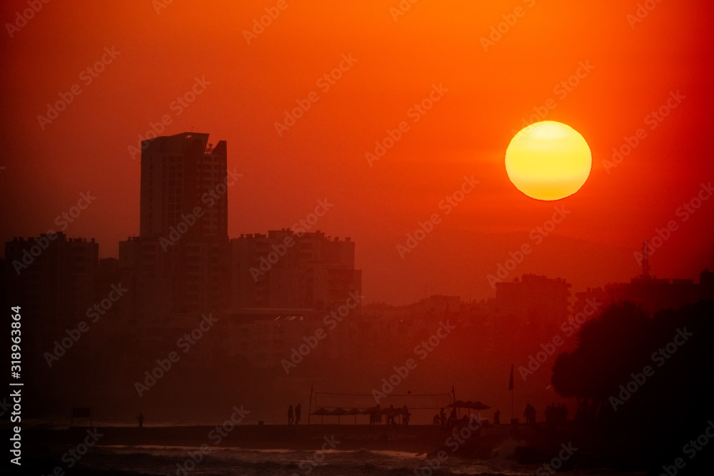 image of skyline of city at sunset