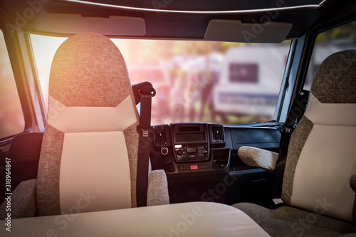 Interior of summer camer with big windows and camping landscape 