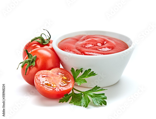 Tomato cherry sauce in bowl, cooking concept. Fresh, organic tomato puree, isolated on white. Healthy vitamin vegetables, vegan diet food condiment. Raw tasty cherry ketchup.