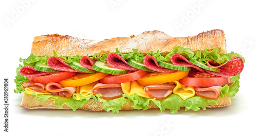 Fresh submarine sandwich with ham, cheese, salami, tomato, lettuce salad, cucumber isolated on white. Colorful tasty baguette homemade large sub sandwich with vegetables. Fast food concept photo
