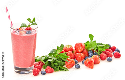 Berry fruits detox fresh smoothie. Colorfull healthy eating diet concept. Raw mixed red berries vegan smoothie food background, creative set strawberry, raspberry, blueberry, mint isolated on white