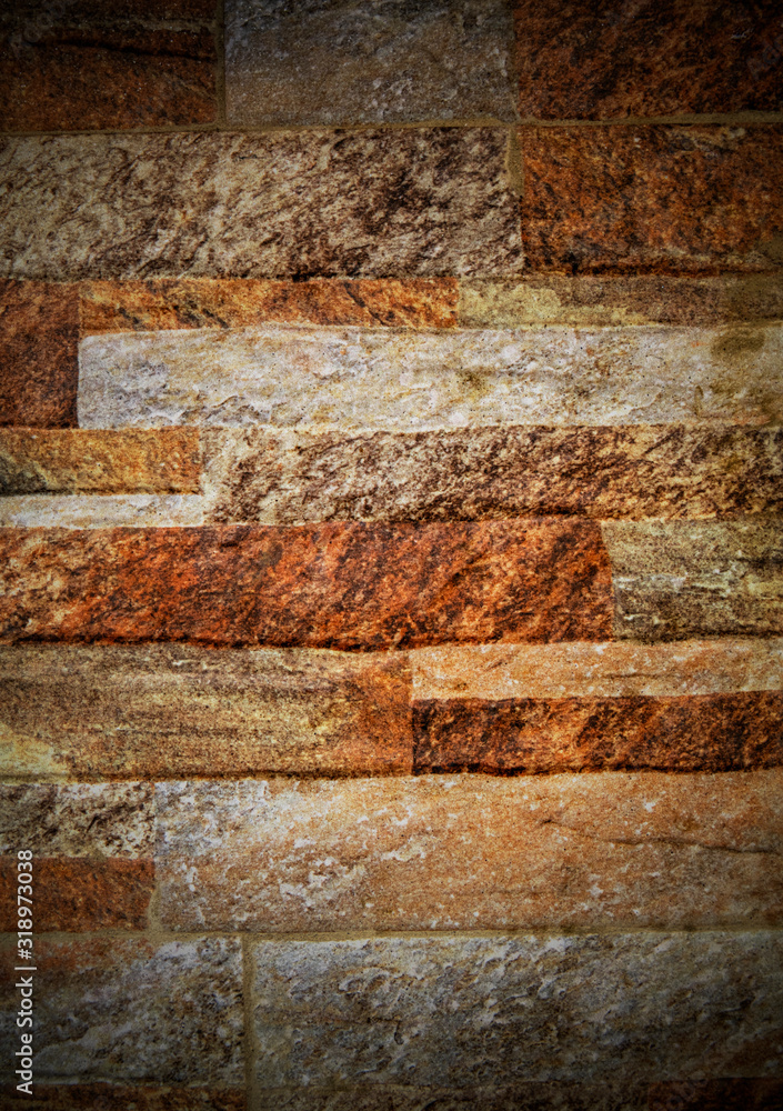A background of colorful stone wall close up view A background of colorful stone wall close up view