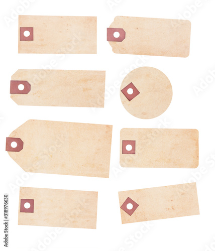 Set of Eight Aged, Yellowing Paper Tags.
