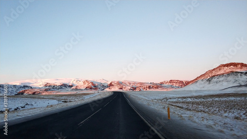Picturesque winter landscape of Iceland. The perfect road to perspective