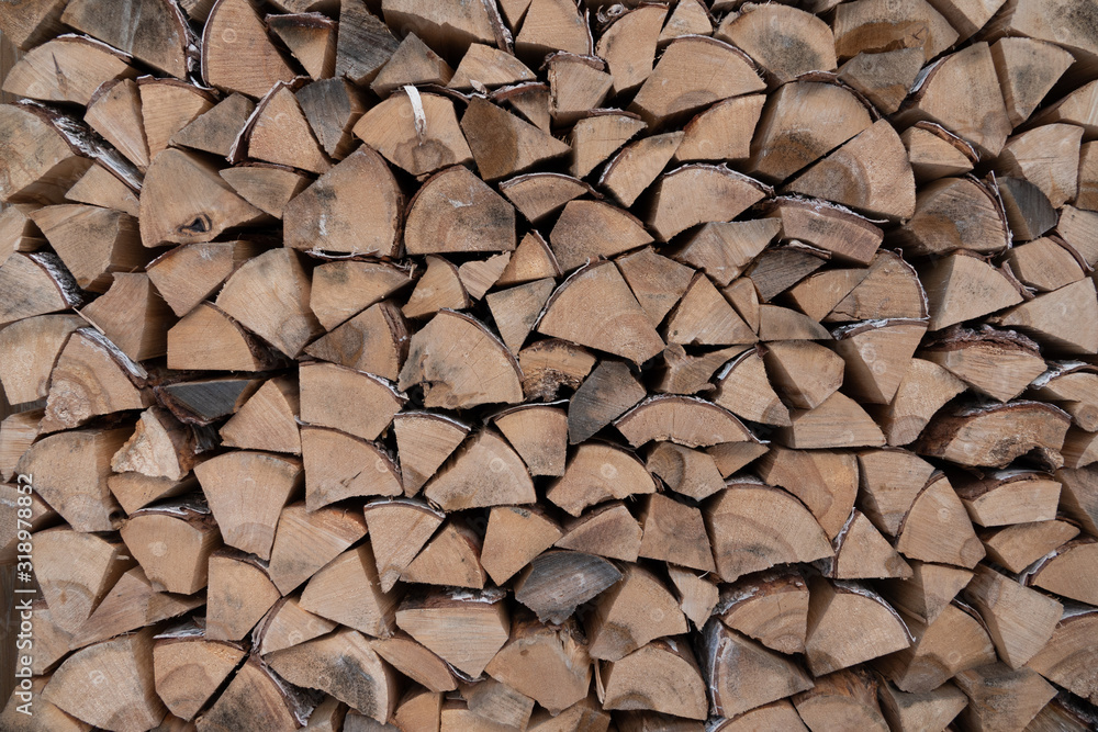Abstract photo of a pile of natural wooden logs background Abstract photo of a pile of natural wooden logs background