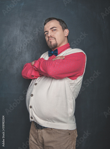 Bilde på lerret Haughty serious funny vintage style man boss on blackboard