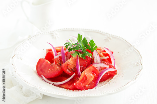 Tomato and onion salad. Selective focus