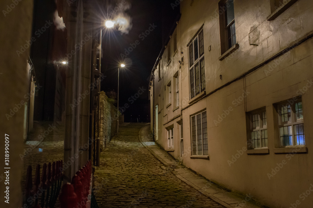 The Dimly Lit Cobbled seaside town alleyway in Swanage